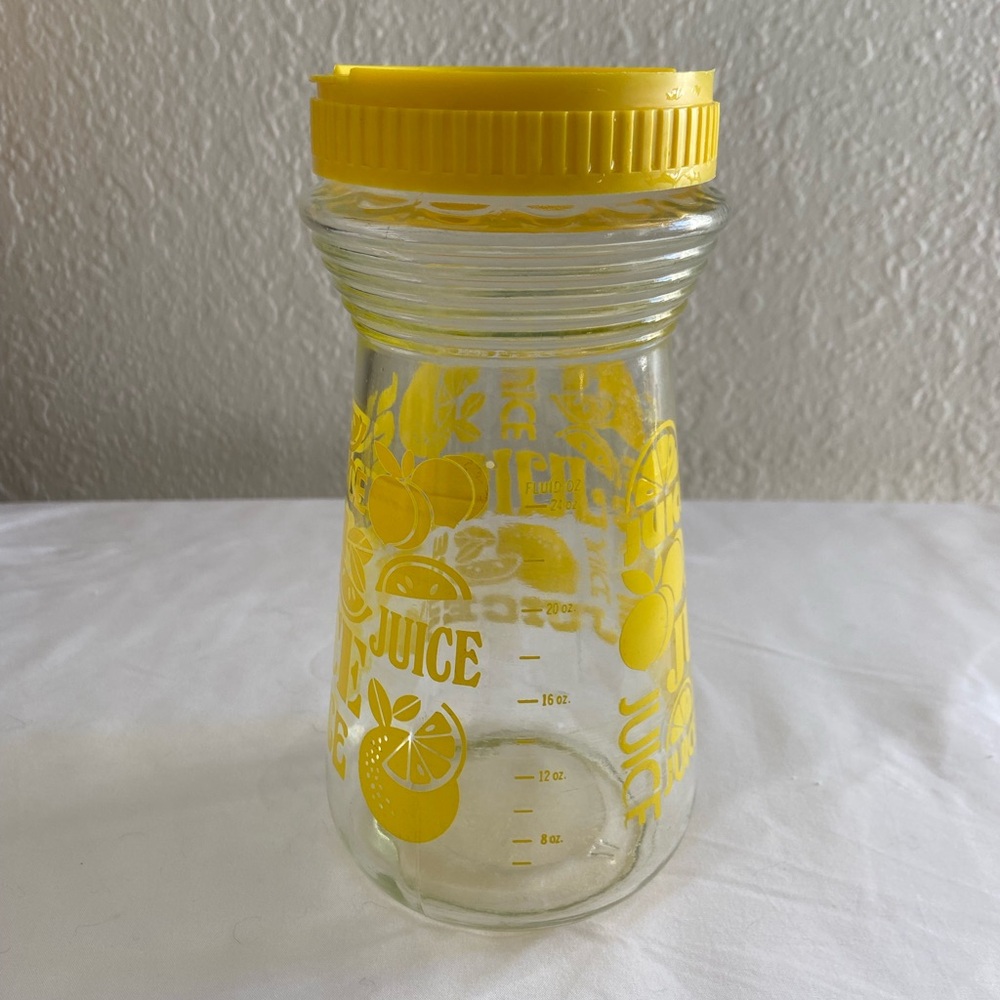 Vintage glass juice jar